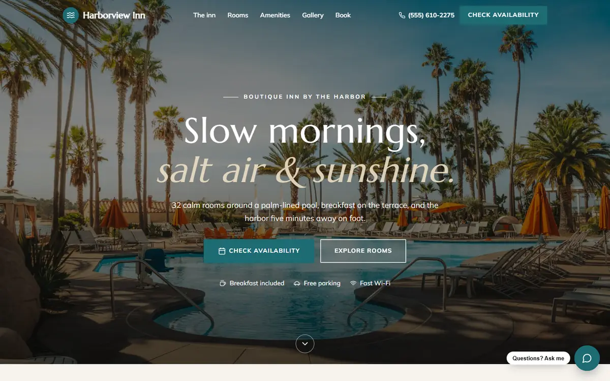 Harborview Inn demo homepage with a palm-lined pool
